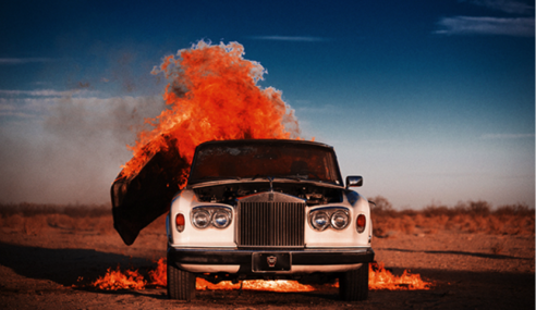 Artist burns Rolls-Royce & calls it art
