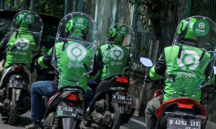 Jakarta’s Motorcycle Taxis Get Creative With Body Shield